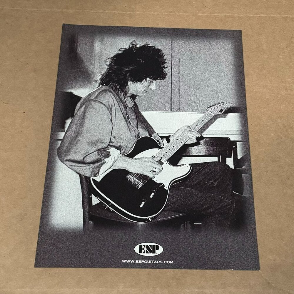 Ronnie Wood of The Rolling Stones - ESP Guitars - 2002 Print Advertisement